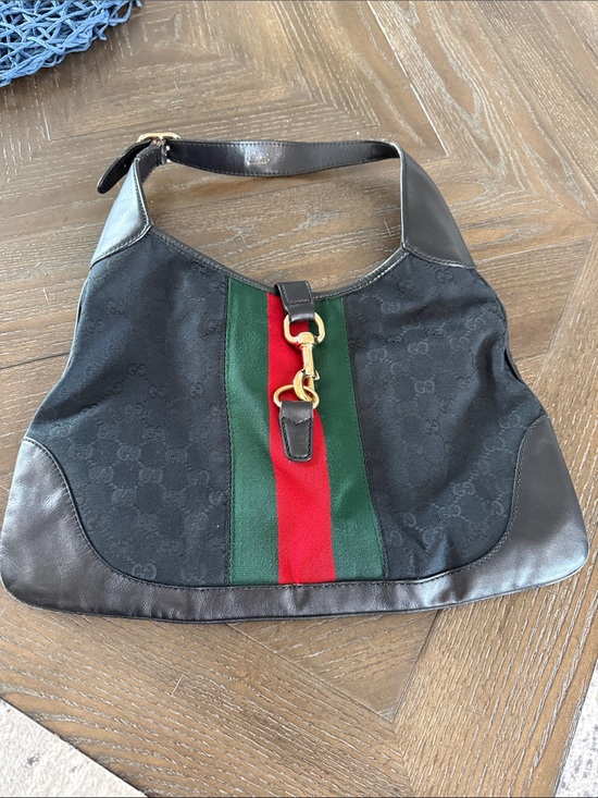 Gucci Handbags - Vintage Gucci Black Leather Strap with Gold Logo